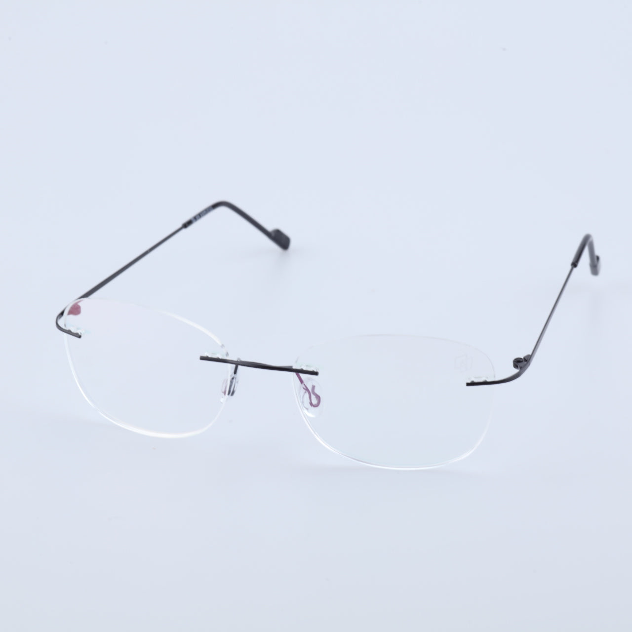Thin black alloy rimless glasses angled view