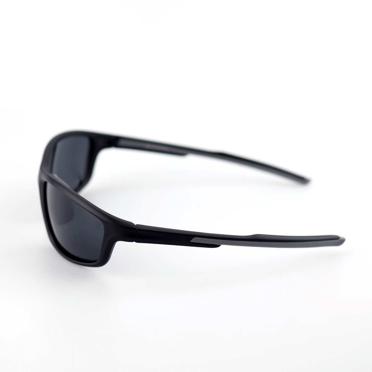 Vault wraparound sports sunglasses side profile with smoke polarized lenses