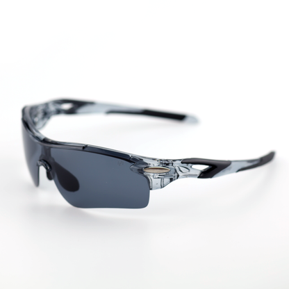 Kinetic translucent gray polymer sports sunglasses angled side view