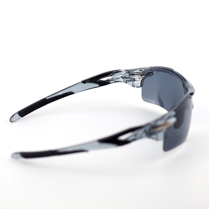 Kinetic translucent gray polymer sports sunglasses angled side view