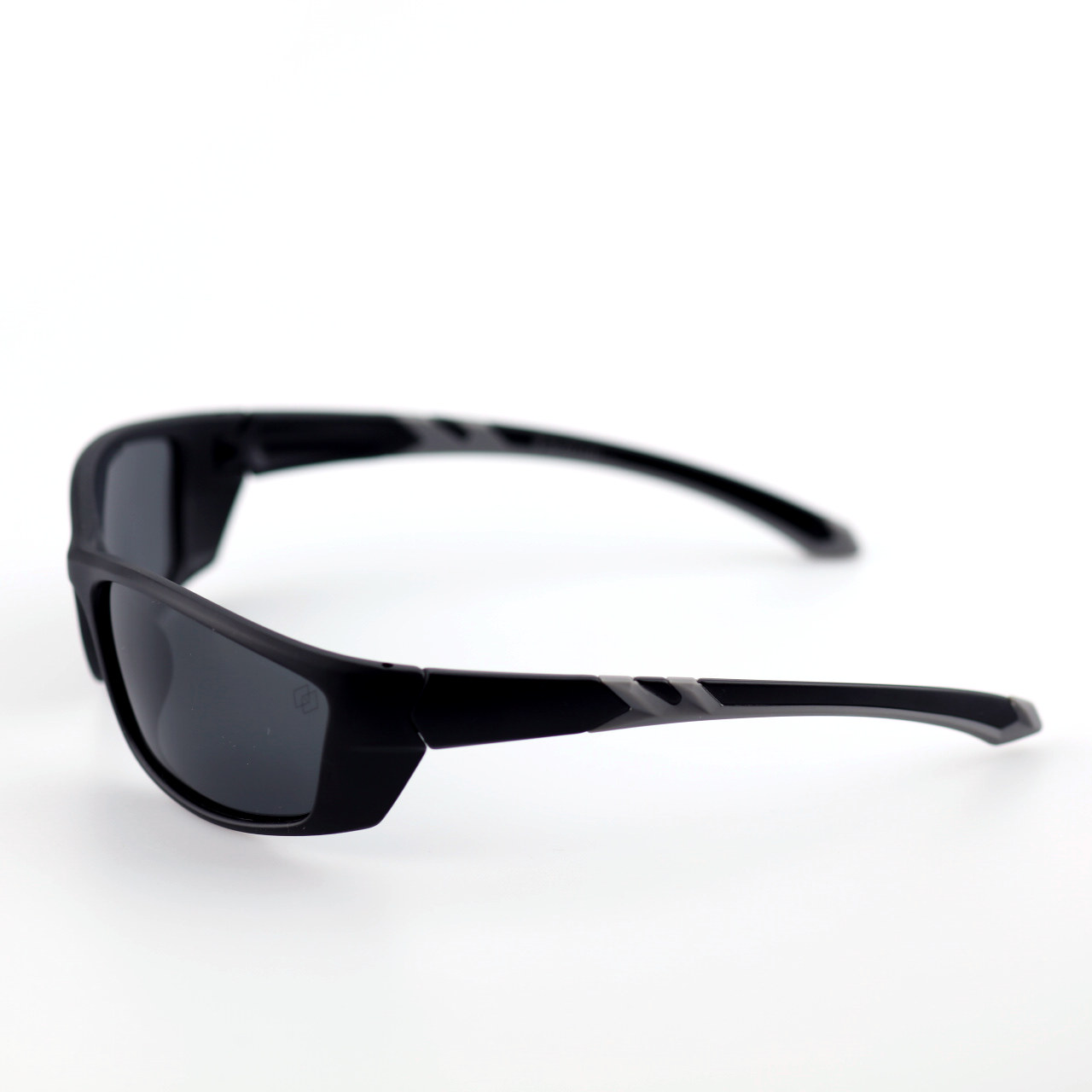 Force black polymer sports sunglasses angled side view with smoke polarized lenses
