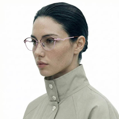 Form acetate titanium geometric glasses worn by model