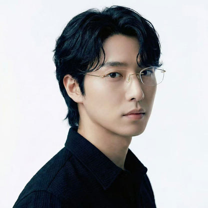 Float gold titanium rimless rectangle glasses worn by male model