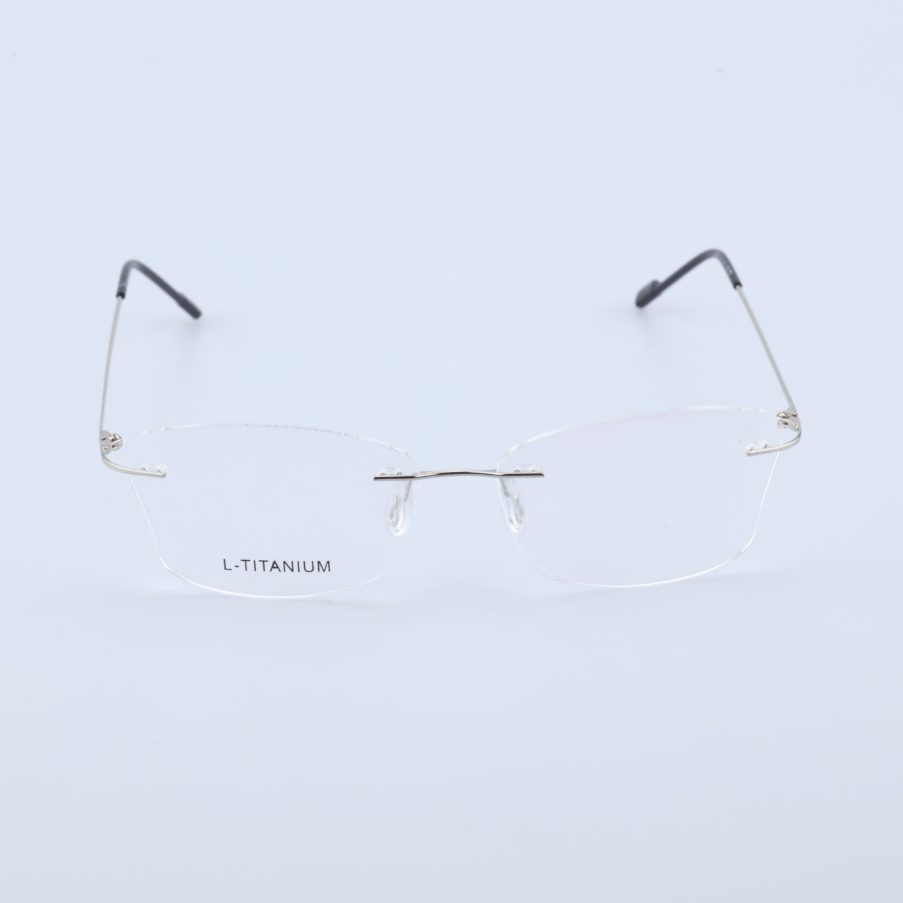 O'S OPTICAL Stow Silver lightweight titanium rimless prescription glasses front view with logo